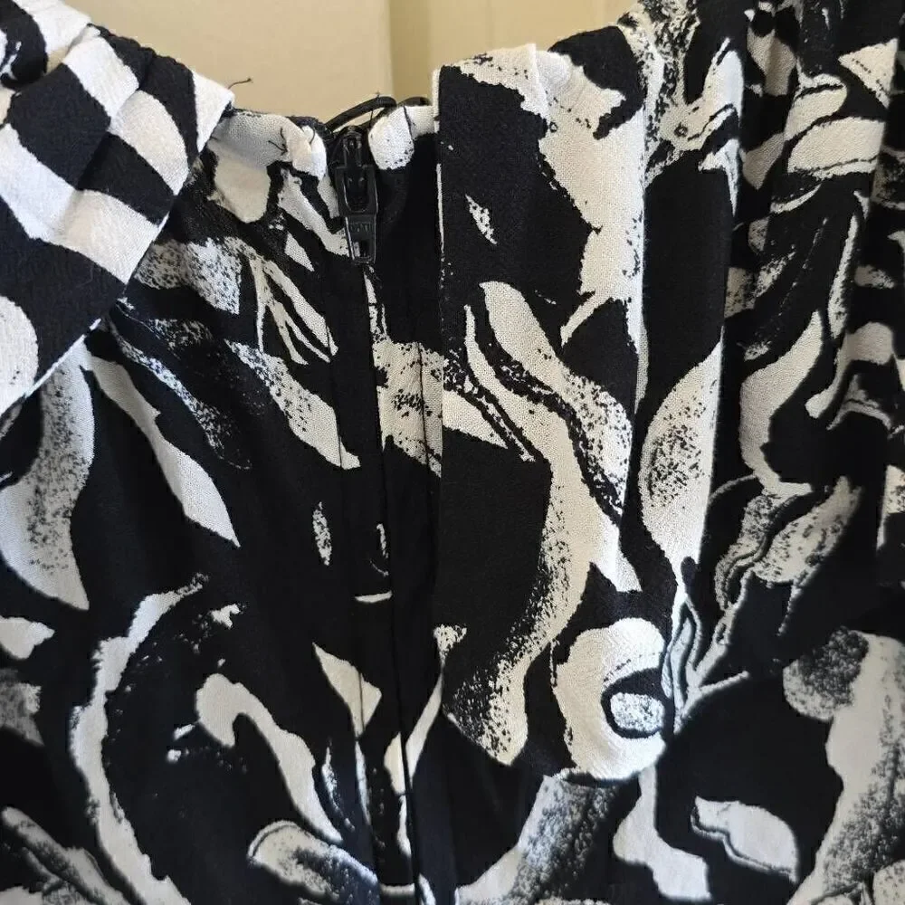 H and M black/ white floral jumpsuit, EUC, Sz. 8